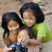 Checking-the-Photo,-Nam-Ou-River,-Laos